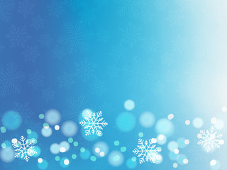 Illustration of Christmas background with blue and white snowflakes and bokeh