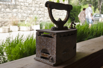 Old retro vintage iron on the balcony