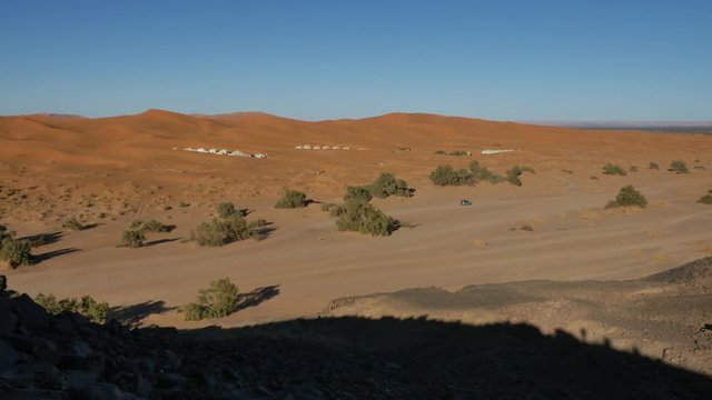 Four wheel drives in the Sahara, traditional entertainment for tourists in Moroccan desert  4K