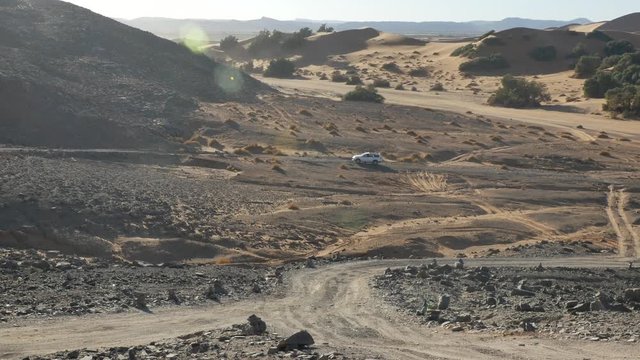 Four wheel drives in the Sahara, traditional entertainment for tourists in Moroccan desert  4K