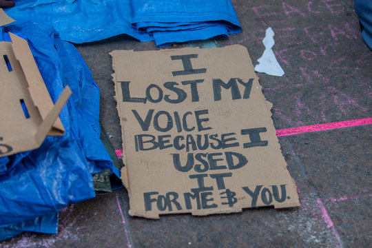 Protest sign on the ground