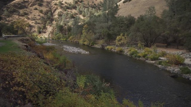 gimbal pan shot of merced river landscape