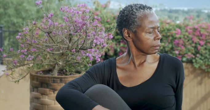 Attractive Senior African American Woman Holding Sitting Yoga Pose