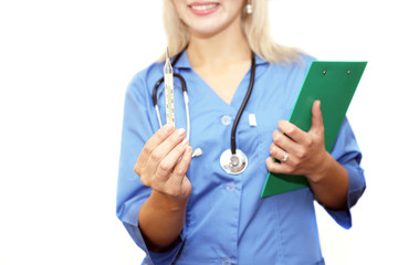 Doctor woman in blue lab coat with thermometer on white background isolated