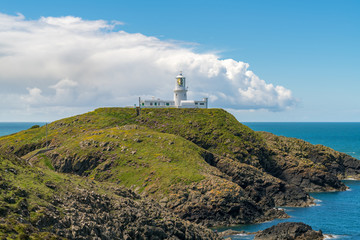 Fototapeta na wymiar Strumble Head Lighthouse near Goodwick, Pembrokeshire, Dyfed, Wales, UK