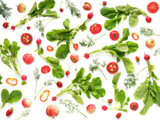 The concept of healthy eating. Pattern composition from vegetables and fruits, top view. Food background, wallpaper. Tomatoes, radish with leaves, pepper, berries, apples isolated on white background.