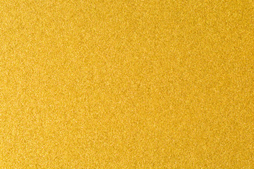 Details of golden texture background. Gold color paint wall. Luxury golden background and wallpaper. Gold foil or wrapping paper