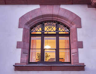 elegant house window, lights on