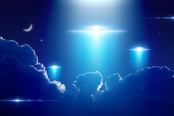 Extraterrestrial aliens spaceships, ufo in dark blue starry sky © IgorZh