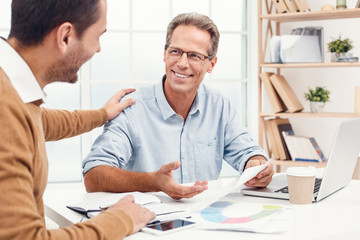 Two business men together in the office