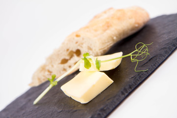 Bread and butter appetiser on a white background