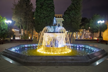 Sabir square fountain, Baku, Azerbaijan at night. The fountain in the city center. Baku Azerbaijan . night vision of a round park Fountains square
