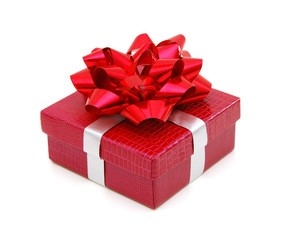 Red gift box with ribbon and bow isolated on the white background