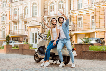 Young couple on scooter travel together transportation