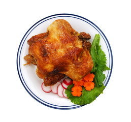 whole grilled chicken served with vegetable