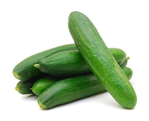 Healthy food. The green cucumbers isolated on white background