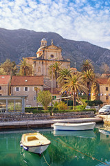 View of Prcanj town and Birth of Our Lady Church. Montenegro, winter