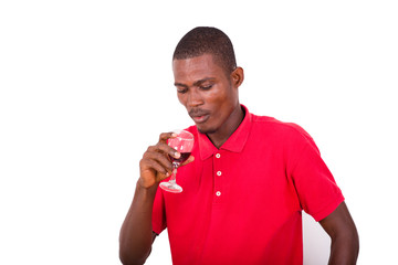 portrait of young man with a glass of wine