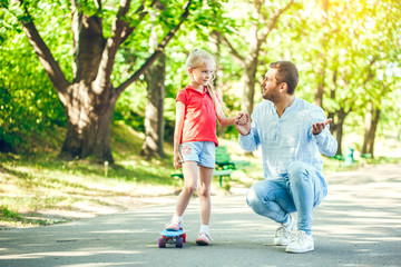 Fototapeta premium Father and daughter walk outdoors family time