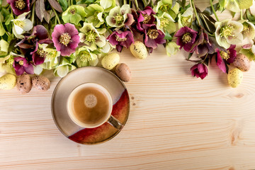 Coffee cup with flowers and Easter eggs