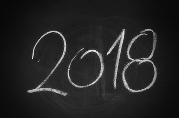 Happy New year, 2018 on chalkboard, blackboard texture