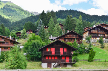 Villages with mountain background in Switzerland.