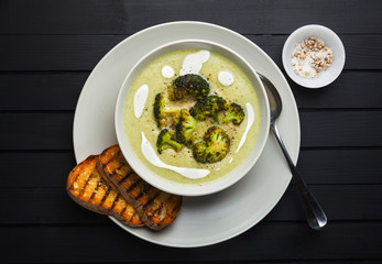 broccoli cheese soup and fresh grilled bread with sour cream and black pepper