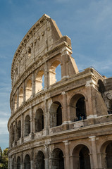 the coliseum in Rome, view of the facade of Coliseum in Rome, Italy - obrazy, fototapety, plakaty