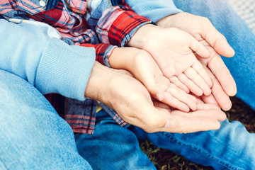 Grandfather and grandson together outdoors family concept