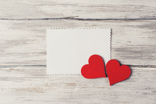 Valentines Card With Couple Herats And Blank Note On Rustic Background