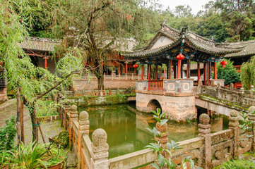 The gardens of a Taoist temple on the sacred mountain of Weibao Shan in Yunnan, China