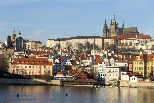 View on the winter Prague gothic Castle above River Vltava in the sunny Day, Czech Republic