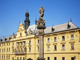 Fototapeta na wymiar Prague municipal court and Monument to Jan Zelivsky at Charles square. Czech Republic