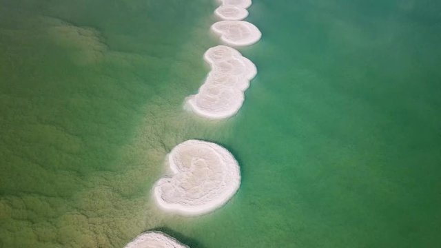 Aerial footage of Salt deposits in the heart of the Dead Sea.