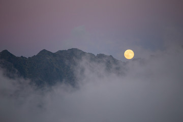 Moon over the mountains Tatry, Poland. © aniad