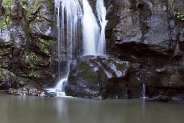 Fototapeta na wymiar waterfall with long exposure shot at mountain