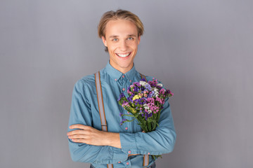 Young person studio isolated on grey wall