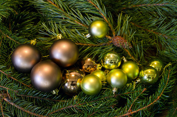 a lot of Christmas balls and pine evergreen branches