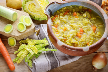 Savoy cabbage soup with potatoes leeks and carrots