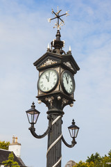 Fototapeta na wymiar Historical Street clock in Ullapool in Scotland.