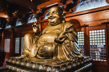 Smiling Golden Buddha Statue.