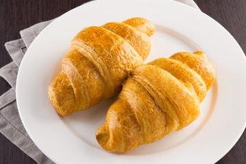 croissants on white plate