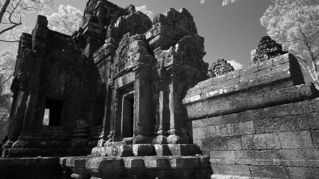 Steadicam gimbal orbiting around the Wat Thommanon in the Angkor Wat architectural world heritage site.