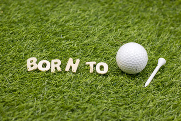 Born to be golfer on green grass