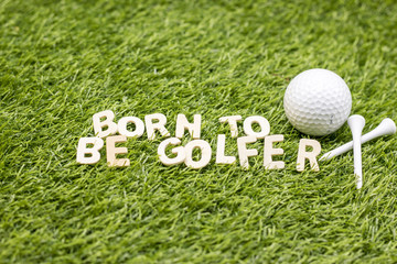 Born to be golfer on green grass