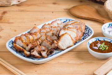 Deep Fried Crispy Pork Belly Cooked with Garlic and spicy dipping sauce