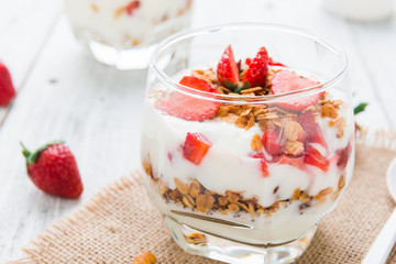 Strawberry , granola and yogurt healthy breakfast parfait