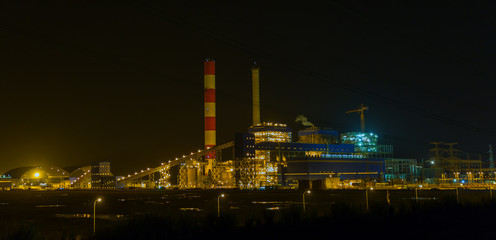 Fototapeta na wymiar Vinh Tan thermal power plant build at Tuy Phong at dusk. Binh Thuan, energy project for industry at Vietnam.