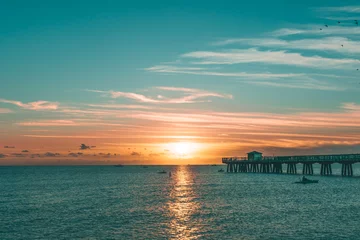 Fotobehang boats and morning sunshine by the pier © Alina McCullen