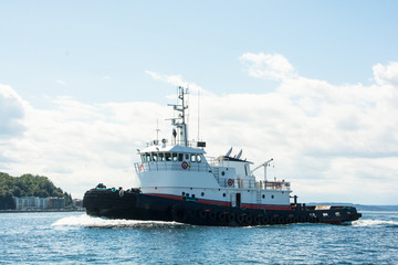 Ocean going tug steaming home on Shilshole Bay